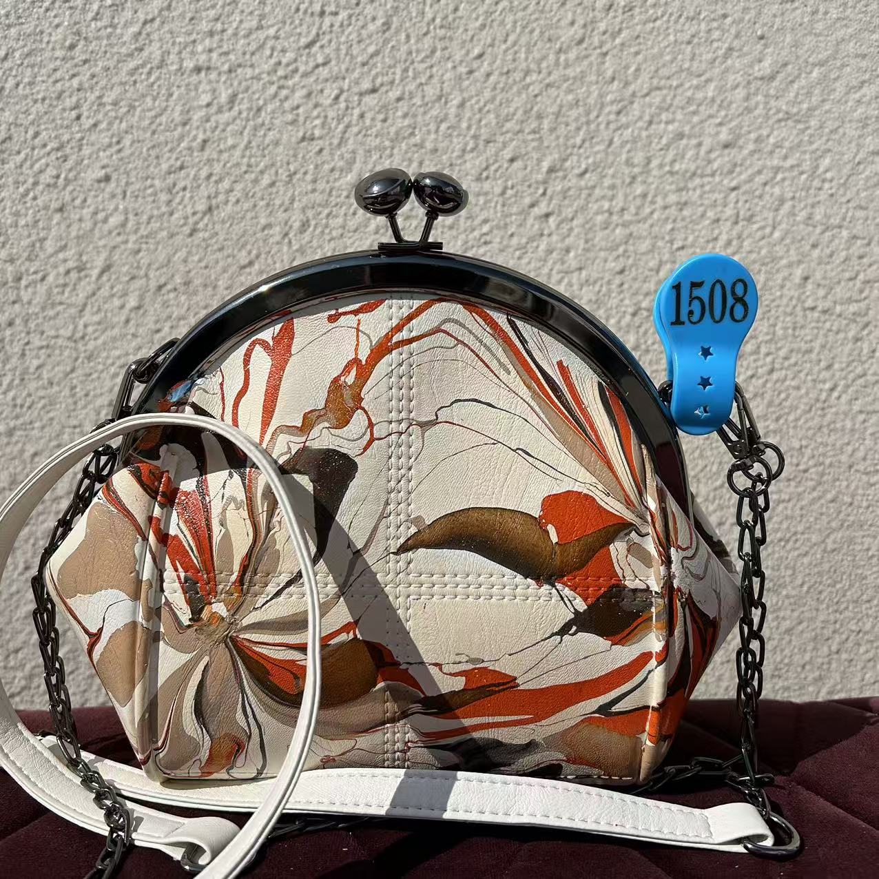 kiss-lock frame crossbody bag